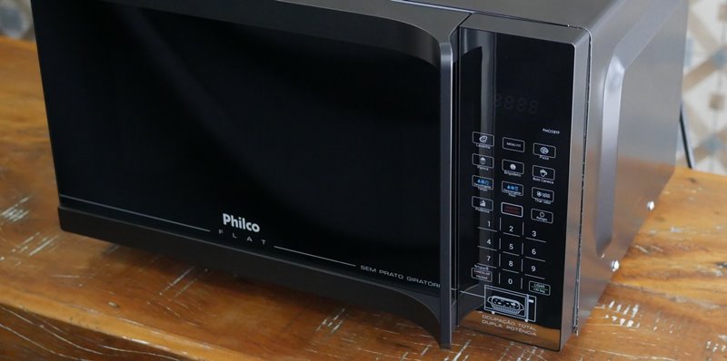 Philco Flat PMO28TF - Imagem sobre pegador invade o espaço